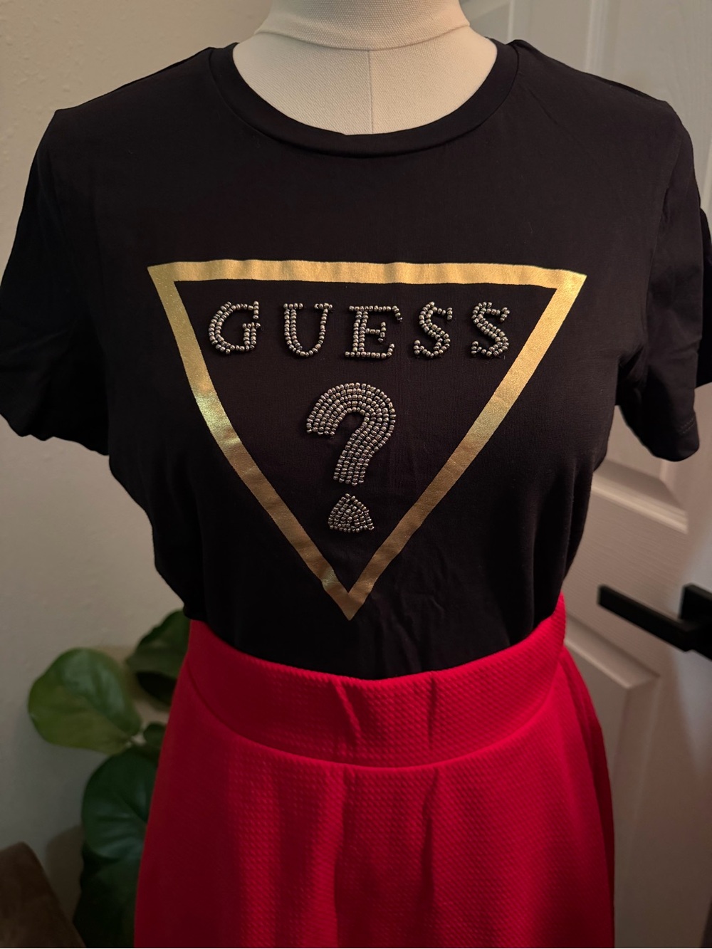 GUESS Black Short Sleeve Tee with Gold Triangle Logo and Rhinestones